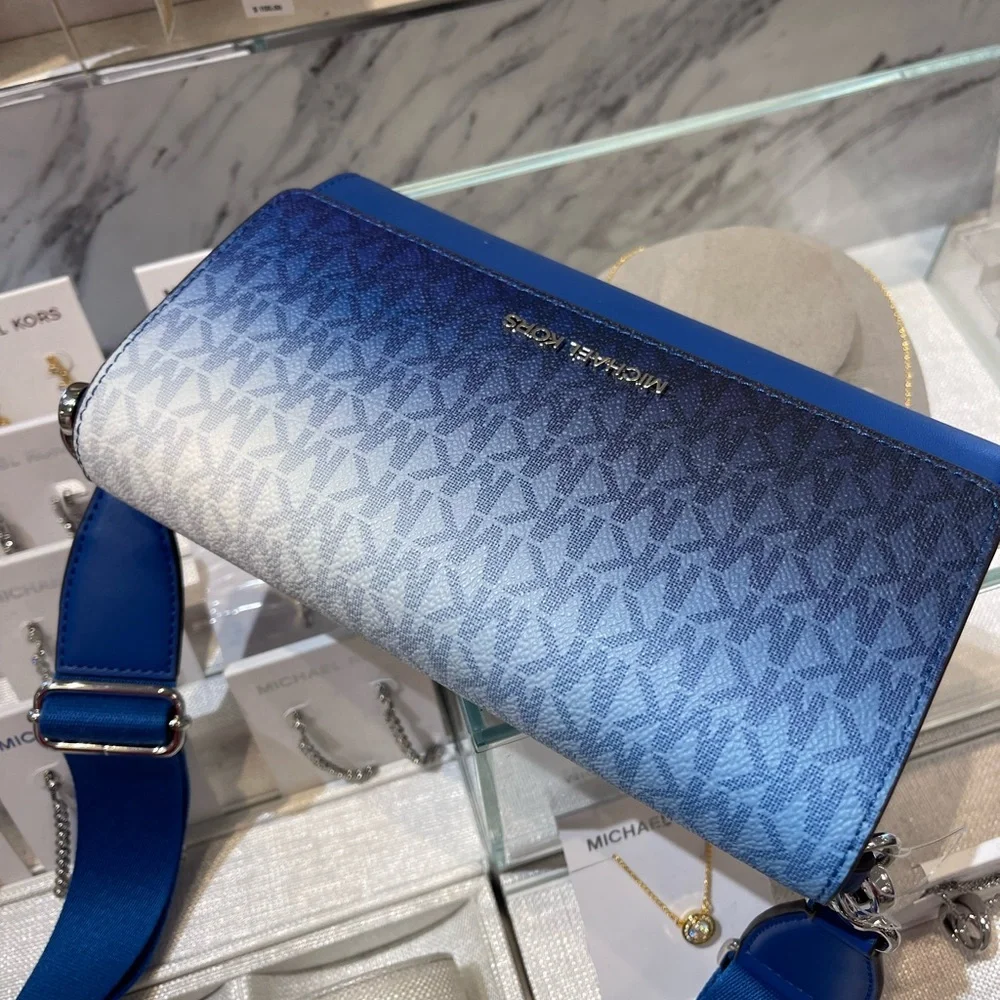 MICHAEL KORS Jet Set Large Ombré Signature Logo Crossbody Bag
Galaxy Blue
NWT - Picture 15 of 16